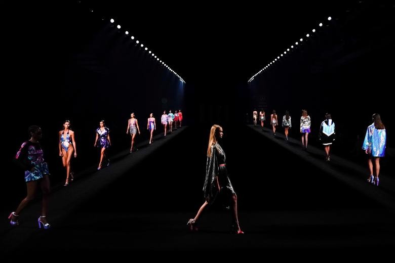 Models present creations by Custo Barcelona during the Mercedes Benz Fashion Week in Madrid, Spain. REUTERS/Juan Medina  
